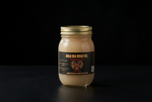Load image into Gallery viewer, Gold Sea Moss Gel jar on a black background
